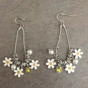 Silver daisy drop down earrings